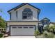 Charming two-story home with a two-car garage and well-maintained landscaping at 17045 Hastings Ave, Parker, CO 80134