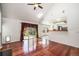 Bright living room with hardwood floors and a view of the backyard at 17045 Hastings Ave, Parker, CO 80134