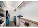 Organized walk-in closet with shelving and hanging rods, providing ample storage space for clothes and accessories at 17045 Hastings Ave, Parker, CO 80134