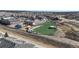 Aerial view showcases a community close to school and recreational facilities, enhancing livability at 16047 E Geddes Ln # 128, Aurora, CO 80016