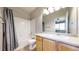 Well-maintained bathroom with tub, shower, vanity with sink, and modern fixtures for comfort and convenience at 16047 E Geddes Ln # 128, Aurora, CO 80016