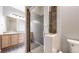 Beautiful bathroom featuring glass shower with updated tile at 16047 E Geddes Ln # 128, Aurora, CO 80016