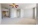 Spacious bonus room with neutral walls and carpet, perfect for any Gathering at 16047 E Geddes Ln # 128, Aurora, CO 80016
