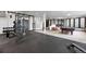 Spacious basement featuring a workout area, pool table, and stylish finishes with sleek black accents for recreation and fitness at 2548 Keystone Dr, Evergreen, CO 80439