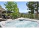 Enjoy this home's hot tub with a view! Relax on the deck with mountain views and serene natural surroundings at 2548 Keystone Dr, Evergreen, CO 80439