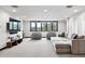 Spacious living room featuring plush seating and natural light at 2548 Keystone Dr, Evergreen, CO 80439