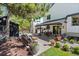 Spacious backyard featuring a modern shed, patio area and lush landscaping at 7633 S Gilpin Ct, Centennial, CO 80122
