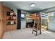 Charming bedroom with a built-in wardrobe and a fun bunk bed with natural wood finish at 7633 S Gilpin Ct, Centennial, CO 80122