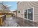 Wooden deck with a sliding door leading into the home at 4623 S Kalispell Way, Aurora, CO 80015