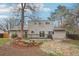 Manicured backyard featuring a stone patio, and deck at 4623 S Kalispell Way, Aurora, CO 80015