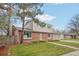 Lovely home featuring a brick facade, well-maintained landscaping, and a spacious front yard at 4623 S Kalispell Way, Aurora, CO 80015