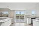 Bright kitchen with sliding doors to outside, complete with modern appliances and granite countertops at 4623 S Kalispell Way, Aurora, CO 80015