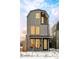 Stylish exterior of this townhouse features contemporary design, large windows, and modern gray siding at 263 S Jackson St, Denver, CO 80209