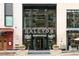 Elegant entrance to the Halcyon hotel with festive holiday decor and a revolving door at 263 S Jackson St, Denver, CO 80209
