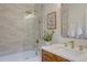 Elegant bathroom featuring subway tile, glass shower, and modern gold fixtures at 31932 Steven Way, Conifer, CO 80433
