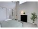 Bedroom with great natural light, features a tall ceiling, and a well placed dresser at 31932 Steven Way, Conifer, CO 80433