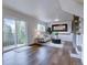 Inviting living room with sliding doors to the exterior and stylish decor, offering a cozy and modern living space at 31932 Steven Way, Conifer, CO 80433
