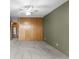 Well-lit bedroom with a ceiling fan, neutral carpet, closet and olive green accent wall at 1121 Albion St # 305, Denver, CO 80220