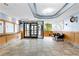 Apartment lobby with mailboxes, tiled floors, seating, and a double-door entrance for residents at 1121 Albion St # 305, Denver, CO 80220