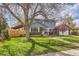 Charming blue two-story home with well-maintained front yard and mature tree at 4707 Ashfield Ct, Boulder, CO 80301
