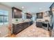 Modern kitchen with granite countertops, stainless steel appliances, and gray cabinetry at 4707 Ashfield Ct, Boulder, CO 80301