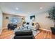Inviting living room features hardwood floors and a neutral color palette with lots of light at 4707 Ashfield Ct, Boulder, CO 80301