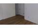 A view of the hallway with access to multiple rooms and neutral-colored walls at 6705 S Field St # 802, Littleton, CO 80128