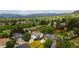 Idyllic neighborhood homes nestled in a lush landscape with breathtaking mountain views at 13249 W Jewell Pl, Denver, CO 80228