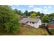 Expansive backyard with covered patio, offering a peaceful outdoor retreat at 13249 W Jewell Pl, Denver, CO 80228