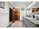 Beautiful bathroom with double sinks, granite countertop, and tile flooring at 3900 Bogey Ct, Longmont, CO 80503