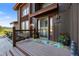 Charming front entrance with a decorative porch and appealing landscaping details at 3900 Bogey Ct, Longmont, CO 80503