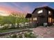 Home exterior showing a well-kept brown home and a serene water view at 3900 Bogey Ct, Longmont, CO 80503