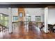 Open hallway view featuring tile flooring and stylish decor at 3900 Bogey Ct, Longmont, CO 80503