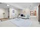 Bright living room featuring a plush carpet, modern decor, and plenty of natural light at 3900 Bogey Ct, Longmont, CO 80503