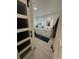 Elegant bathroom with double vanity, modern fixtures, and neutral tile flooring at 6179 S Bemis St, Littleton, CO 80120
