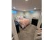 Basement bedroom with a bed and dresser at 6179 S Bemis St, Littleton, CO 80120