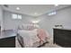 Cozy bedroom featuring a comfortable bed with soft linens and modern decor for a relaxing ambiance at 6179 S Bemis St, Littleton, CO 80120