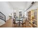 Modern dining area with glass table and sleek chairs at 3195 Blake St # 201, Denver, CO 80205