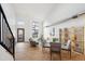 Bright, open living room features modern decor, wood floors, and lots of natural light at 3195 Blake St # 201, Denver, CO 80205