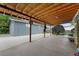 Extensive covered patio featuring a wooden ceiling, offering a perfect space for outdoor dining and relaxation at 1263 W 103Rd Pl, Northglenn, CO 80260