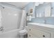Bright bathroom with a tub, shower, vanity, and mirror, creating a functional and appealing space at 8535 E Otero Cir, Centennial, CO 80112