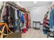 Well-organized closet with ample storage for clothes and accessories at 1812 S Hazel Ct, Denver, CO 80219