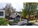 Aerial view of a quaint home featuring a charming exterior, fenced yard, and convenient street parking at 444 Inca St, Denver, CO 80204
