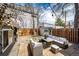 Backyard patio area featuring comfortable seating and string lights at 444 Inca St, Denver, CO 80204