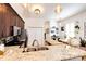 Bright kitchen featuring granite counters, stainless steel appliances, and an adjacent dining area at 444 Inca St, Denver, CO 80204