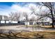 Neighborhood park and playground with basketball court, swings, slides, and climbing equipment at 444 Inca St, Denver, CO 80204