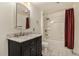 Well-maintained bathroom features marble countertop vanity, shower and bathtub, ideal for unwinding at 21924 E Lake Ave, Aurora, CO 80015