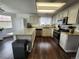 Well-lit kitchen with granite countertops, modern appliances and ample storage space at 21924 E Lake Ave, Aurora, CO 80015