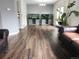 Living room with hardwood floors, light gray walls, and built-in fish tanks at 21924 E Lake Ave, Aurora, CO 80015