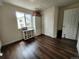 Bright office boasts hardwood floors, a closet, and a window for natural light, perfect for work or hobbies at 21924 E Lake Ave, Aurora, CO 80015